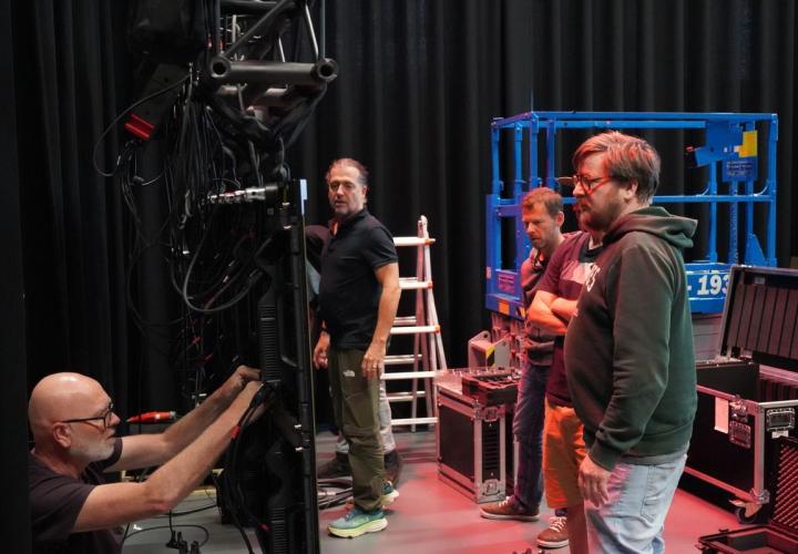 AV technicians performing hands-on LED wall stacking setup at the ROE Visual ROE Academy Course in Leek, The Netherlands